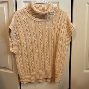 Cream color cable knit sweater . Worn once.